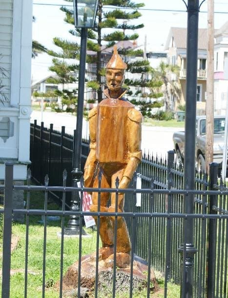 A James Phillips sculpture of the tin man is made of live oak and located at 17th and Winnie in Galveston. Image Copyright 2010 Paul Roberts