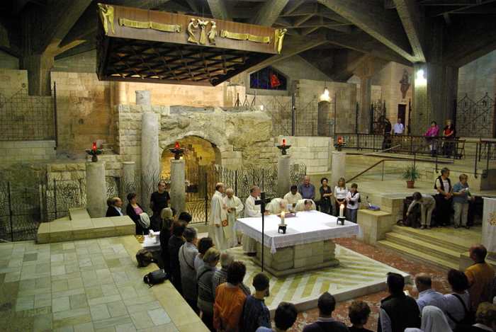 Catholic Mass conducted in the very spot Roman Catholics believe the Annunciation took place--the Grotto of the Annunciation beneath the church.