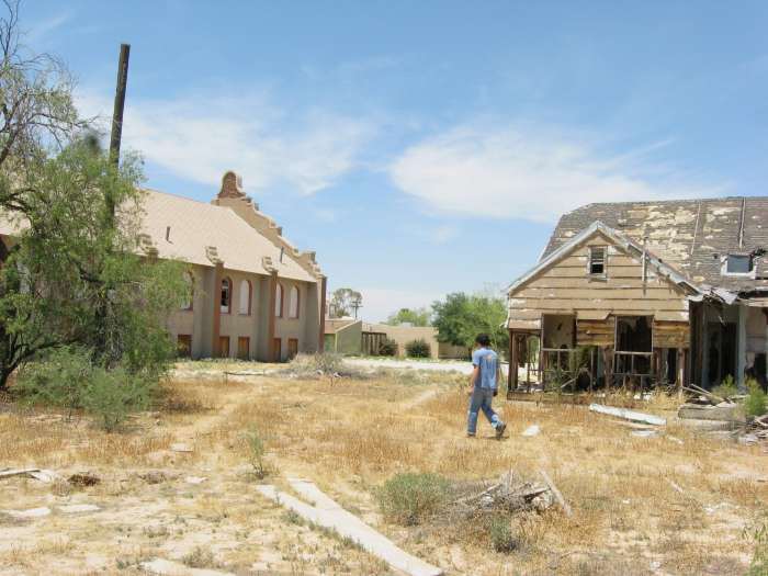 Ruins of historic Cook Church and half-burned parsonage in Sacaton, AZ
