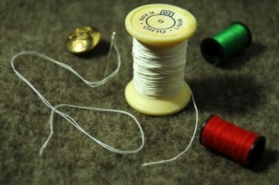 Don't forget to remove the stickers from the ends of your spools, it makes it easier to pass the cord through the spool.