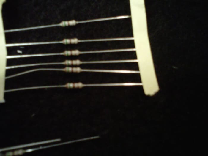 Resistors. They can be installed any which way, there is no polarity, no + or - with these guys.