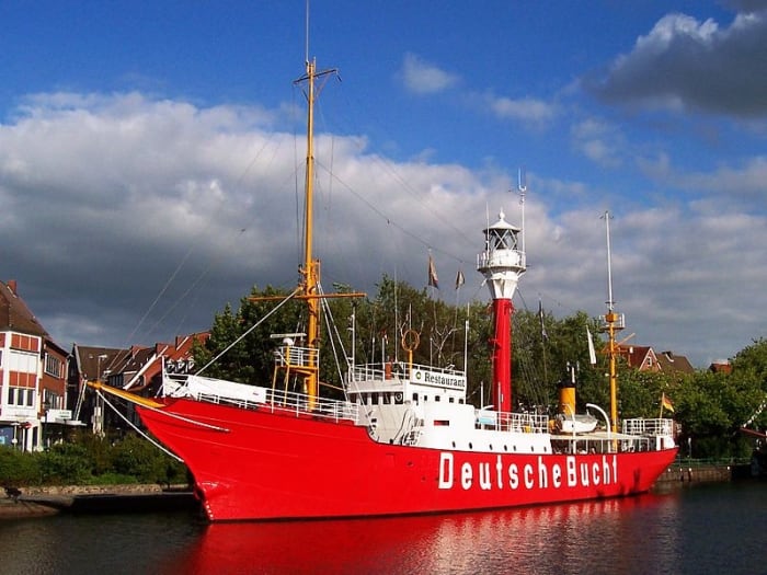 Lightvessel (Feuerschiff) Amrumbank was decommissioned in 1983 and converted into a maritime museum and restaurant in Emden, Germany. Painted on its side is the Amrumbank's last post before retirement: "DeutscheBuch", or "German Bight/Bay".