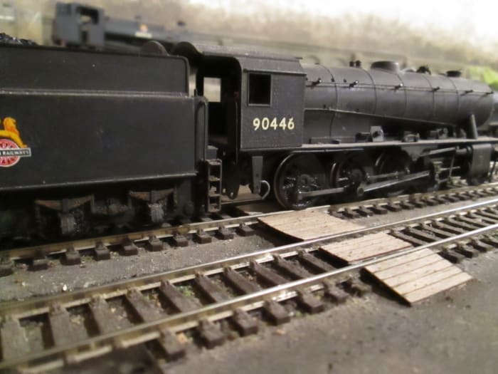 Riddles' WD 2-8-0 was introduced during WWII, some went overseas after D-Day. Many were taken over by the LNER, subsequently BR(E). This is 90446 of Newport Shed (51B) near Middlesbrough (Bachmann model)