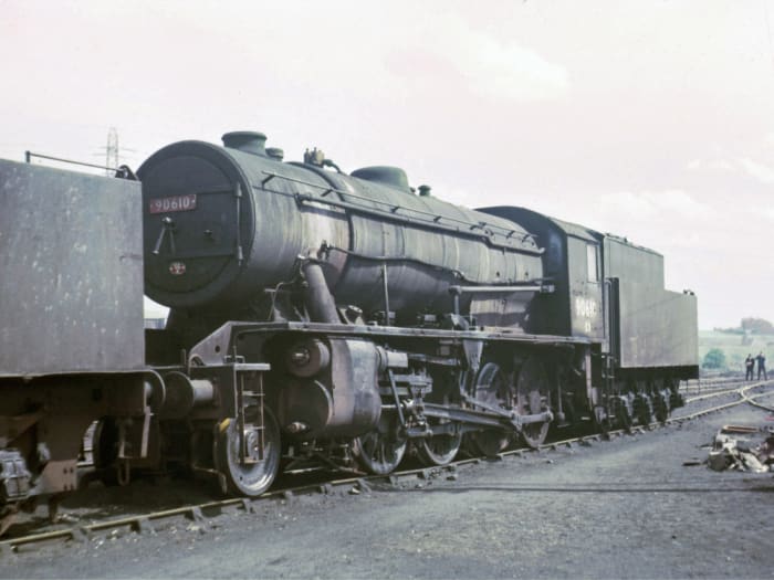 WD 2-8-0 on shed, Wakefield May1966 (56A) before being sent for scrap - built 1946 for Ministry of Supply; weight, loco 70 tons 5 hundredweight (cwt), tender 44 t 8.5 cwt