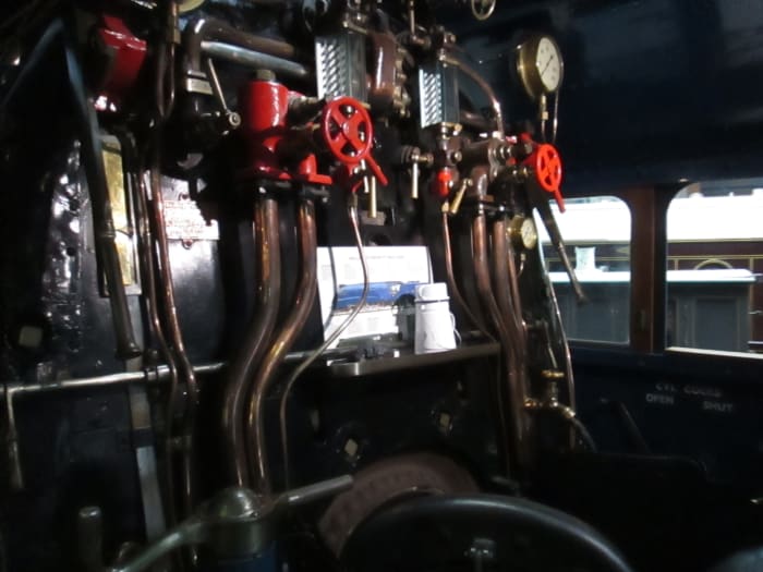 Looking into the cab of 'Mallard' at the NRM, complete with crewman's tea can (white enamel pot with handle)