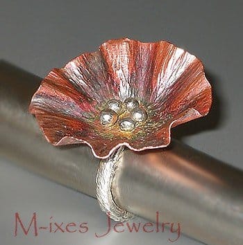 Marjorie of M-Ixes Jewelry finds Etsy a good place to sell her beautiful metalwork. (Oh and check out the banner by yours truly :P)