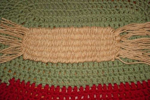 The straw weaver can make quick work of a woven belt project, woven straps, or anything else you wish to weave. This bookmark was done in less than an hour on the weaving tool. Turned on it's side, it's easy to see how simply weaving longer can creat