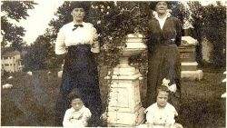 A photograph of Selma, Felix and Lillian Asplund sitting in the tombs of the Asplund shortly after the tragedy of the Titanic and Carl's funeral in Worcester, Massachusetts, USA.