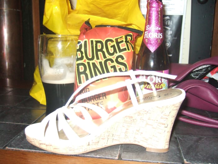 Realism involves representing real life. In this image, my birthday is represented by the wearing of high heels and the consumption of special products that have meaning to me.
