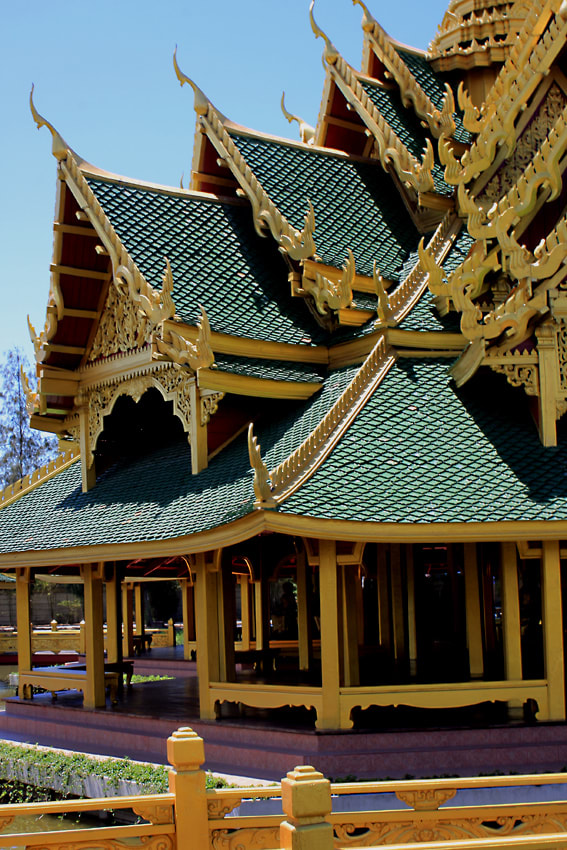 The decorative, intricately designed entrance of the Pavilion of the Enlightened - one of the most beautiful buildings in Muang Boran