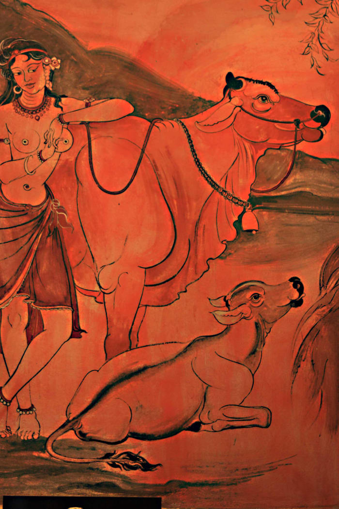 Gopi, a female cow herder, in a painting in the Sanphet Prasat Palace which elsewhere also depicts Shiva as a musician