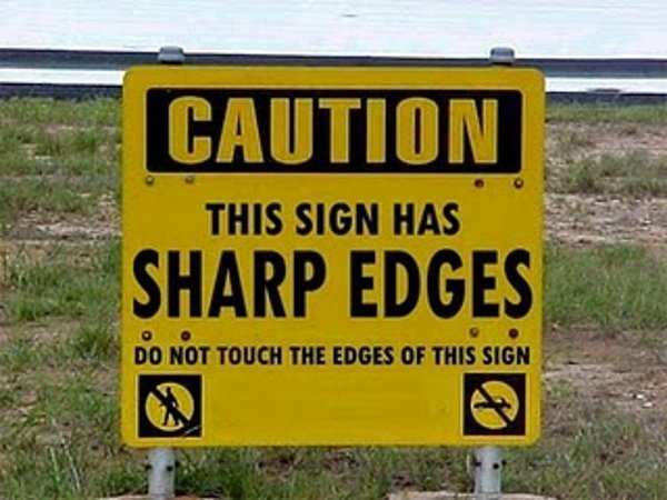 Thanks for the warning! I just had the most uncontrollable urge to touch the corners of that sign, but the warning in bold print convinced me! WHEW!