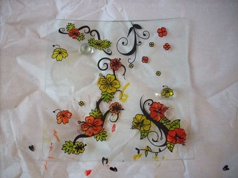 How about serve your guests reception food on stained glass plates. DIY plates, use dollar store glass plates, stencils and paint underneath side.