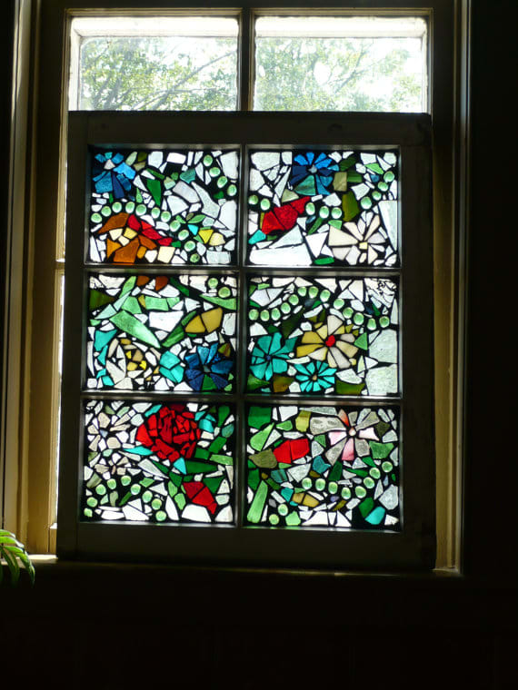 Beautiful floral Stained glass window perfect for a wedding with red rose accents. Exactly the kind of piece to seek out.