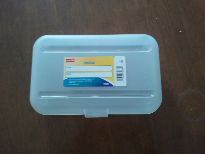 A simple pencil box can be used to save space with your board games. They can be found out Staples, Walmart or some dollar stores.