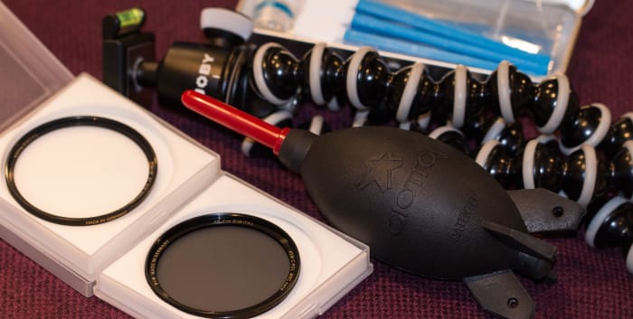 A few necessary accessories for me to start with - camera sensor cleaning kit, Gorillapod, rocket air-blower and a couple of lens filters.