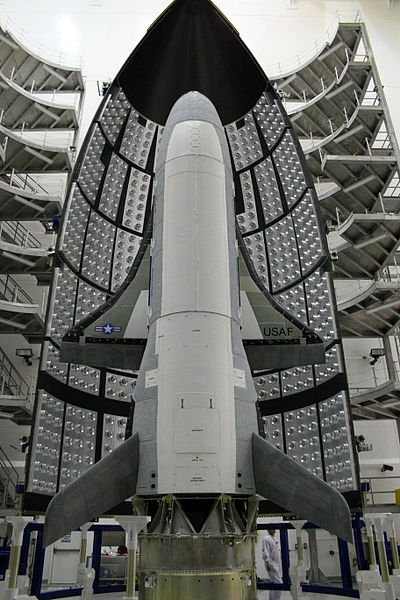 This photograph of the X-37B Orbital Test Vehicle in the encapsulation cell at the Astrotech facility in Titusville, Florida was taken on April 13, 2010. The X-37B is the US's newest and most advanced unmanned re-entry spacecraft.