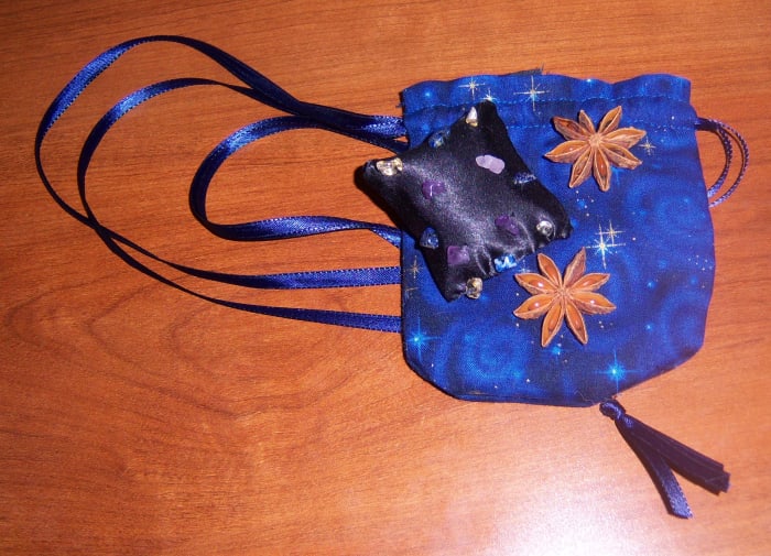 The finished gift! It looks good, if I say so myself, and smells very pretty. I also included a hand-written list of what's in the pillow and the symbolism to everything.