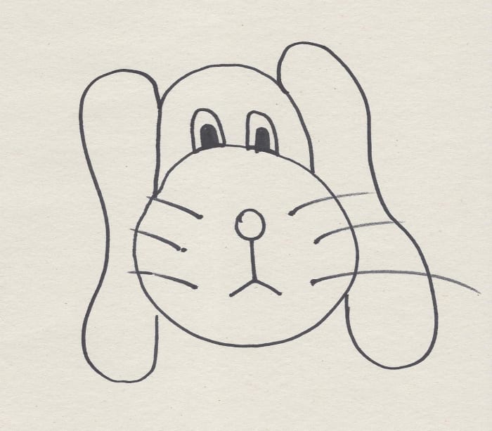Draw blobs on either side of the semi-circle/circle that could pass for both a slide and ears. Give yourself some creative license here!