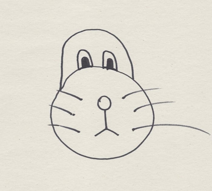 This is usually when kids realize it is a dog or animal! Give the tunnels some depth so the eyes have pupils.