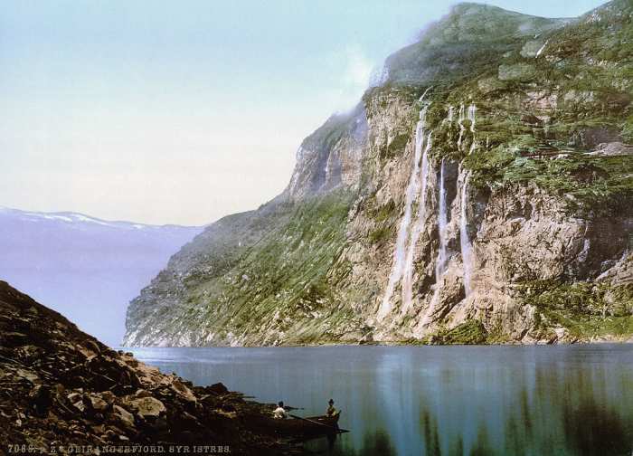 This beautiful scene shows one of the many fjords on the coast of Norway, well protected by the cliffs that surround it.
