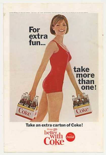 advertising poster for Coca Cola stating "for extra fun...take more than one!" with brunette in red swim suit carrying two 6 packs of Coca Cola