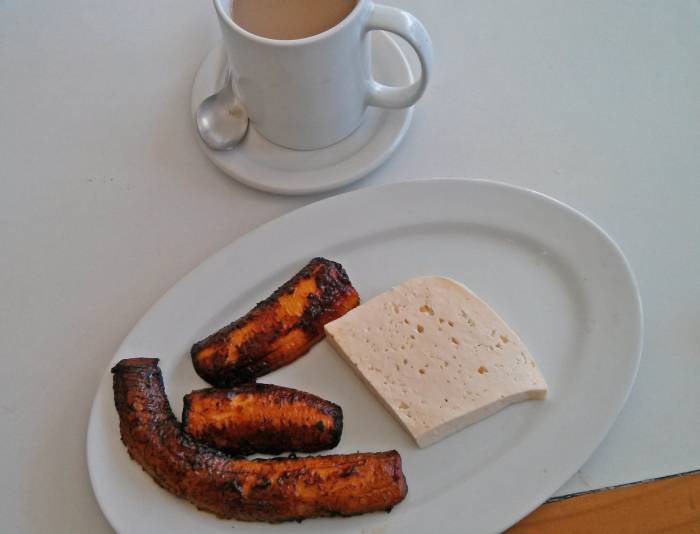 For a quick pick-me-up and snack, have a cup of coffee with cooked mature plantain and fresh white cheese. All three flavors complement each other quite well.