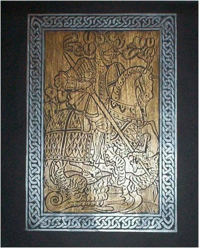 Brass rubbing of St. George and the Dragon using a bronze crayon for St. George and a silver crayon for the frame around the picture.