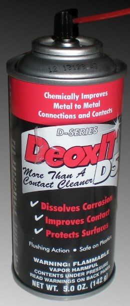 Deoxit makes many fine electronics sprays designed to clean and protect your equipment. D5 is what I usually use. There are other manufacturers of similar products.