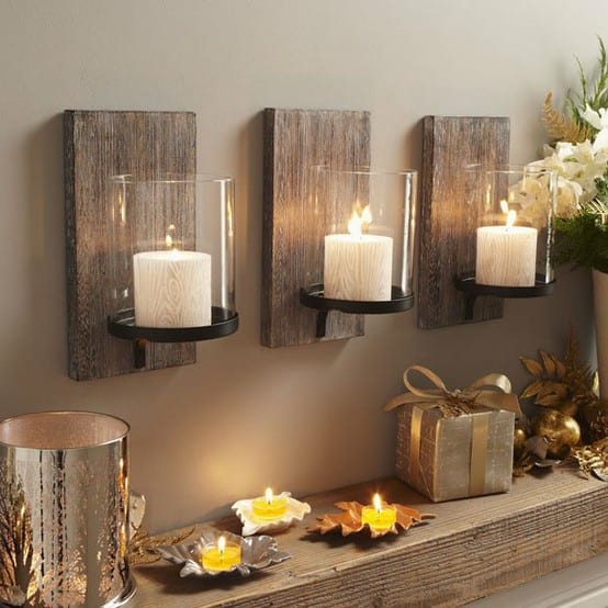 Three more free scrap wood pieces, flat metal holders, $1 for all three at a yard sale, and three Dollar Tree candles and glass tubes $4.50 on sale all in makes the total investment in the top portion of this arrangement $5.50
