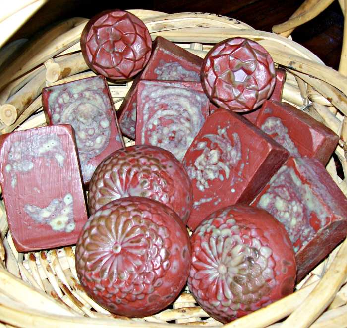 Dragon's Blood Soap showing some browning after a few days. The gradual browning--and even the disappearance of some soap colorants--is an effect of the high vanillan content of the Dragon's Blood fragrance oil.
