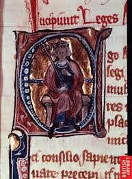 Alfred the Great pictured in the letter A of an illuminated manuscript from the Middle Ages.