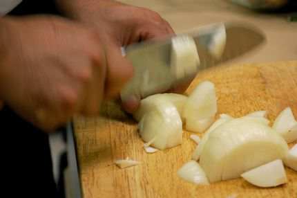 Onions produce Sulfuric Acid when cut! When the acid gets into your eye, your eye makes tears to wash the acid out, and you cry.