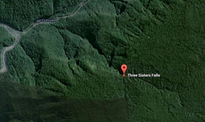 The Three Sisters Falls are located so deep in the jungle of Peru that even the Google satellite has not captured a clear enough image to show us yet. The falls are located very close to the marker in the picture and are flowing from right to left.