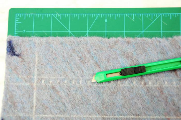 Supervise the cutting of felt with a blade cutter. A small sharp pair of nail scissors will do the job just as well