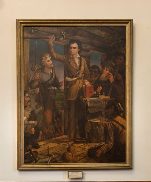 This painting, by Henry Arthur McArdle, shows Stephen Austin rallying the colonists. The mysterious Baron de Bastrop is listed as the man in the lower left corner.
