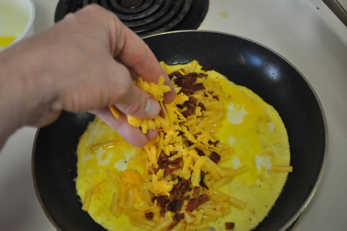 If you wanna make an omelette, you gotta break some eggs! That's NOT mac & cheese in my hand, just cheddar.
