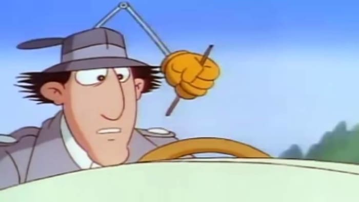 Inspector Gadget is seen here in the speed boat wondering why he has been pursued by Dr. Claw's agents.