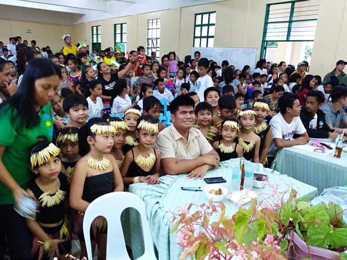 The board of judges together with the Grade I-GT learners during the school-based nutrition month activities in Masinloc Central Elementary School, Masinloc, Zambales.