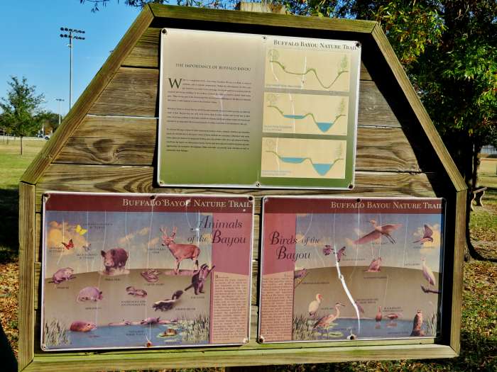 Freedom Park sign is showing the Importance of bayous, wetlands, and ponds as well as the wildlife calling these places home.