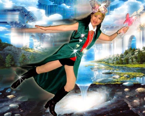 I have lots of butterfly paraphernalia including a mask so I made up this superhero persona. I also borrowed this green coat from dayzeebee. Perfect fit! Now I can fly...wheeee...