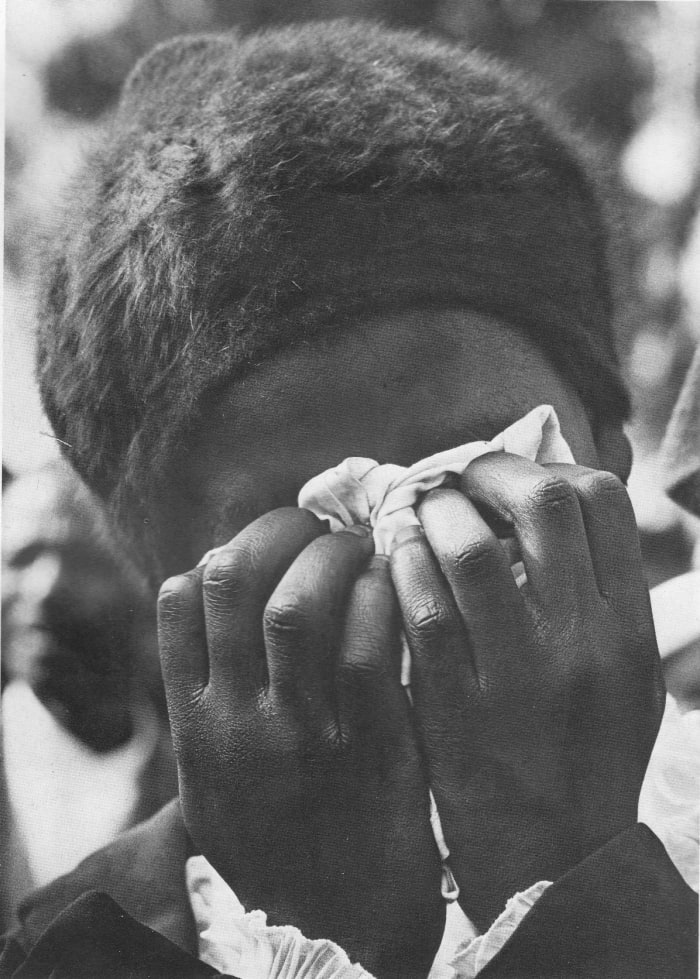 Cry The Beloved Peoples - woman mourner crying at one of the funerals of the 1976 police brutality and murder victims