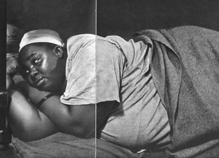 Maternity Ward in South AFrica and due to a shortage of beds, a pregnant woman about to give birth lying on the floor. Botha was right, they were not paying people to bring Black children into the world.