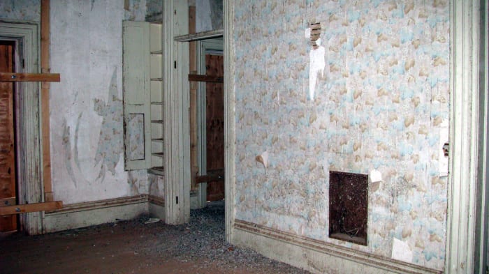 This room was supposedly Mrs. Bayly's bedroom on the second floor. It is assumed so because there is a dressing area on the other side of this door and what looked like it might have been a closet. Strange because they didn't build closets at the t
