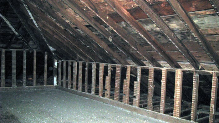 Second photograph taken in the attic. Two orbs in this one too... This area was located on the right side of where we were standing. The first was taken straight on from the top of the stairway back into the room.