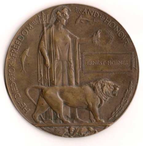 Designed by Edward Carter Preston. ~ Public Domain. - See: http://en.wikipedia.org/wiki/File:Memorial_Plaque.jpg