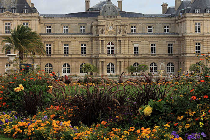 Sometimes it's a good idea to get down low and hide a boring expanse of lawn or concrete (or people or garbage bins) behind some foreground interest such as this flower bed
