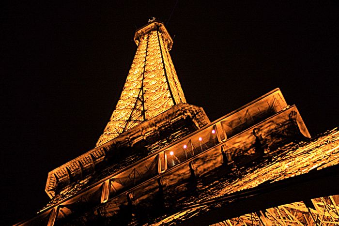 THe Eiffel Tower lights up the night sky. Several more photos showing the Eiffel Tower in all of its night time spleandour will appear of Page 3 of this series