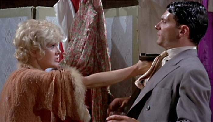 Annie Borg (Connie Stevens) and Eddie Hagen (Tony Musante) have a difference of opinion in the course of their tempestuous relationship