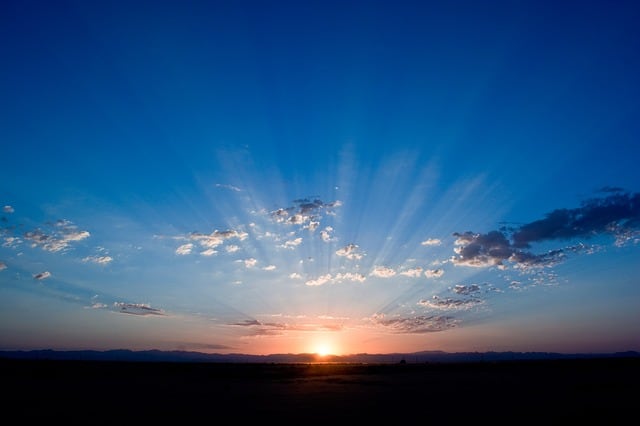 The sun rises over the Earth bringing a new day; Spring- a time for fertility and awakenings- relates to the land, and to us in our youth.